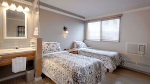 Premium bedding, pillowtop beds, desk, blackout drapes