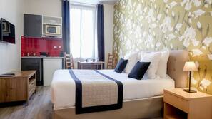 Premium bedding, laptop workspace, soundproofing, iron/ironing board