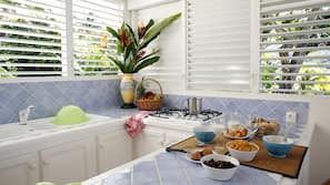 Fridge, microwave, cleaning supplies