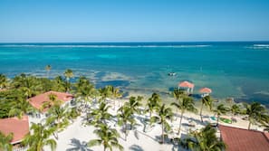 On the beach, sun-loungers, beach umbrellas, beach towels