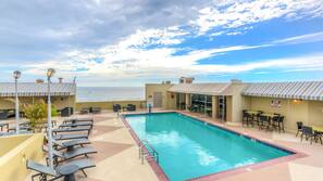 On the beach, beach cabanas, sun loungers, beach towels