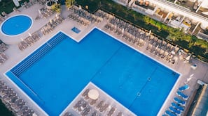 2 outdoor pools, pool umbrellas, pool loungers