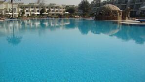 Outdoor pool, pool umbrellas, pool loungers