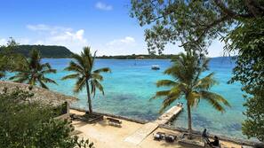 Private beach, white sand, sun-loungers, beach umbrellas