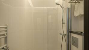 Shower, free toiletries, hair dryer, towels