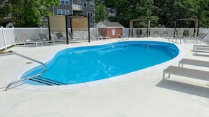 Seasonal outdoor pool, pool loungers
