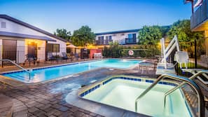Outdoor pool, pool umbrellas, sun loungers