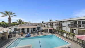 Outdoor pool, pool umbrellas, sun loungers