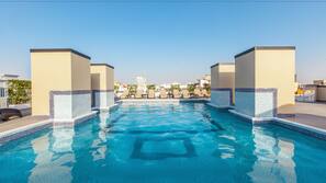 Outdoor pool, pool umbrellas, pool loungers