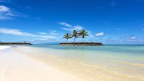 Private beach, white sand, sun loungers, beach umbrellas