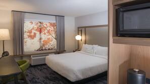 Premium bedding, desk, blackout curtains, iron/ironing board