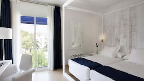 Minibar, caja fuerte, escritorio y cortinas opacas