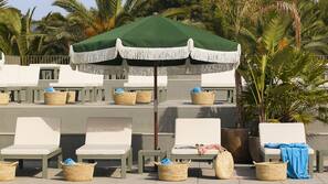 Seasonal outdoor pool, pool umbrellas, pool loungers