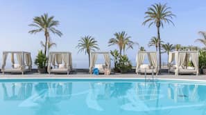Seasonal outdoor pool, pool umbrellas, pool loungers