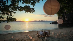 On the beach, sun loungers, beach umbrellas, beach towels