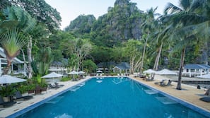 Outdoor pool, pool umbrellas, sun loungers