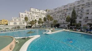 Outdoor pool, open 10 AM to 7 PM, pool umbrellas, sun loungers