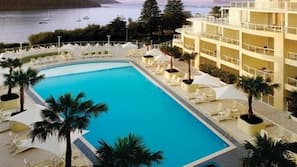 Outdoor pool, pool umbrellas, pool loungers