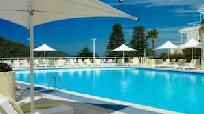Outdoor pool, pool umbrellas, pool loungers