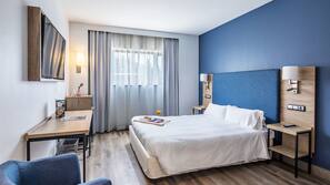 Ropa de cama de alta calidad, edredones de plumas, minibar y caja fuerte