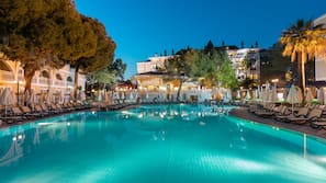 Indoor pool, seasonal outdoor pool, pool umbrellas, pool loungers