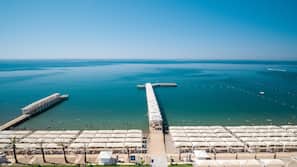 Private beach, free beach shuttle, sun-loungers, beach umbrellas