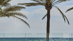 Indoor pool, outdoor pool, pool umbrellas, pool loungers