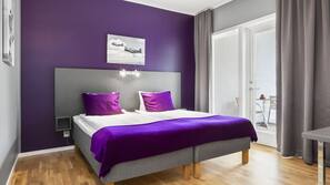 Hypo-allergenic bedding, desk, blackout drapes, iron/ironing board