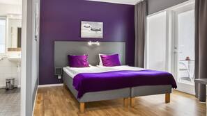 Hypo-allergenic bedding, desk, blackout drapes, iron/ironing board
