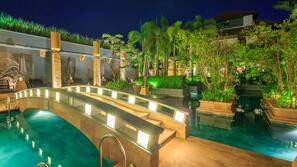 2 outdoor pools, open 6:00 AM to 7:00 PM, pool umbrellas, pool loungers