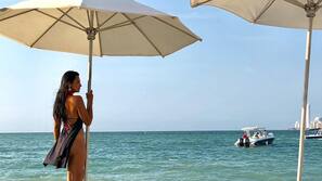 On the beach, white sand