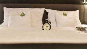 Premium bedding, pillow top beds, minibar, in-room safe