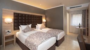 Premium bedding, pillow top beds, minibar, in-room safe
