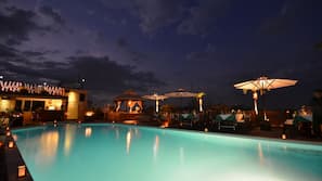 Outdoor pool, pool umbrellas, pool loungers