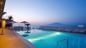 Outdoor pool, pool umbrellas, pool loungers