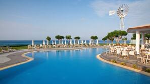 Indoor pool, seasonal outdoor pool, pool umbrellas, sun loungers