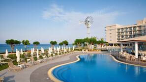 Indoor pool, seasonal outdoor pool, pool umbrellas, sun loungers