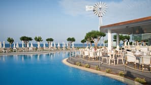 Indoor pool, seasonal outdoor pool, pool umbrellas, sun loungers