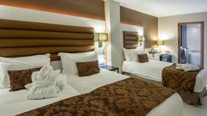 Ropa de cama de alta calidad, edredones de plumas, minibar y caja fuerte