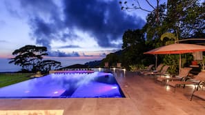 Outdoor pool, an infinity pool, free cabanas, pool umbrellas