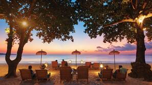 On the beach, white sand, free beach cabanas, sun-loungers