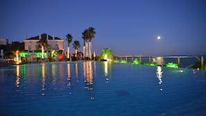 Indoor pool, outdoor pool, open 7 AM to 8 PM, pool umbrellas