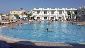 2 outdoor pools, pool umbrellas, pool loungers
