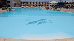 2 outdoor pools, pool umbrellas, pool loungers