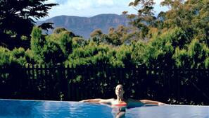 Indoor pool, outdoor pool, pool umbrellas, sun loungers