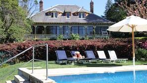 Indoor pool, outdoor pool, pool umbrellas, sun loungers
