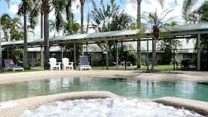 Outdoor pool, open 8 AM to 8 PM, pool loungers
