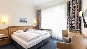 Premium bedding, down duvet, in-room safe, desk