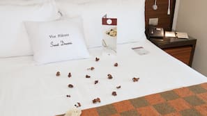 Premium bedding, memory foam beds, minibar, in-room safe