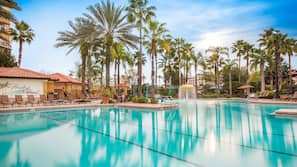 2 outdoor pools, open 7:00 AM to 11:00 PM, pool umbrellas, pool loungers